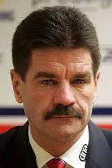 A man with a mustache and beard